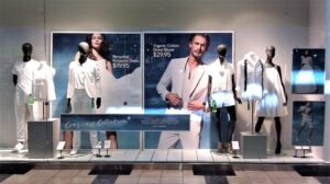 Promotional retail window signs